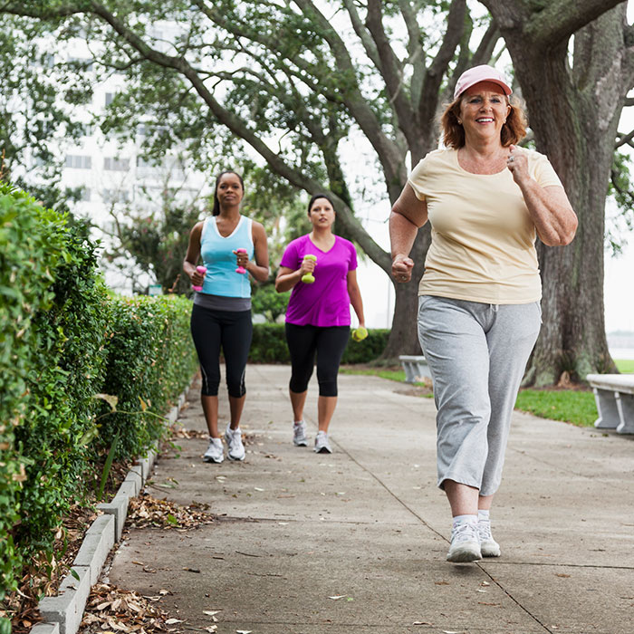 two children cross sidewalk