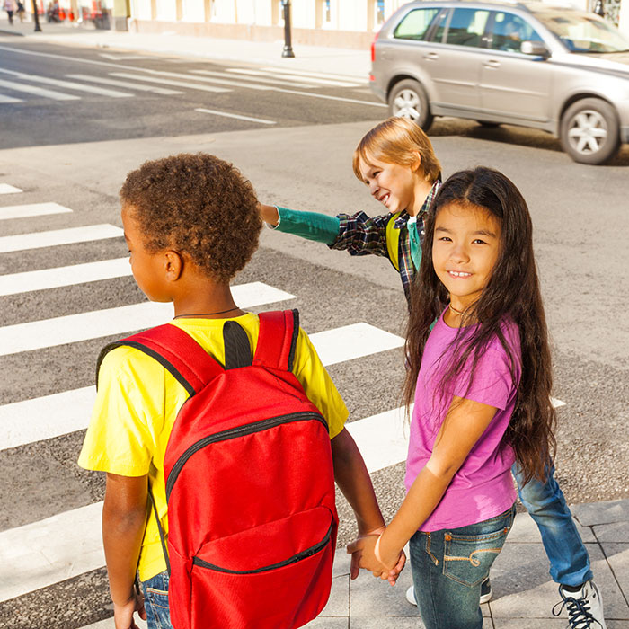 child at crosswalk