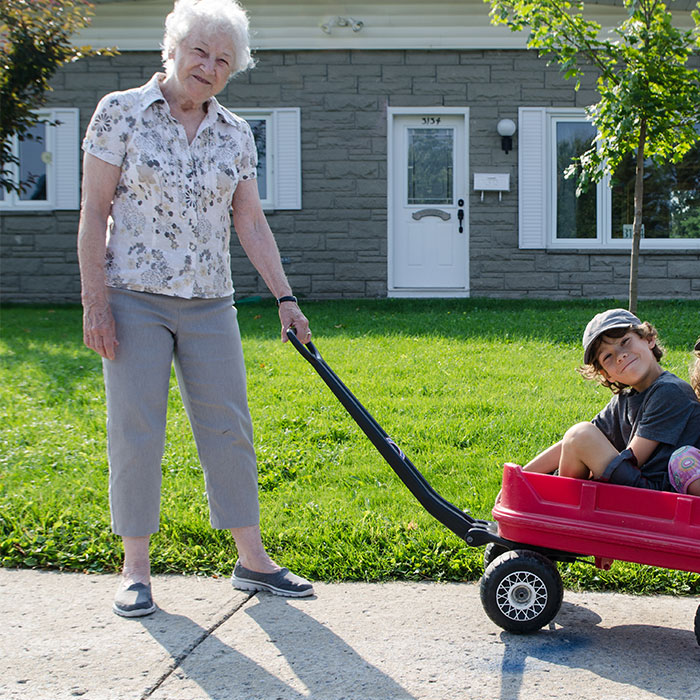 elderly woman with children