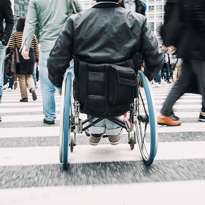 two children cross sidewalk