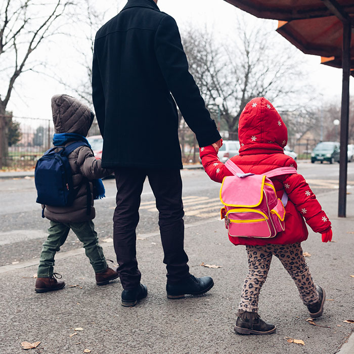 two children on sidewalk
